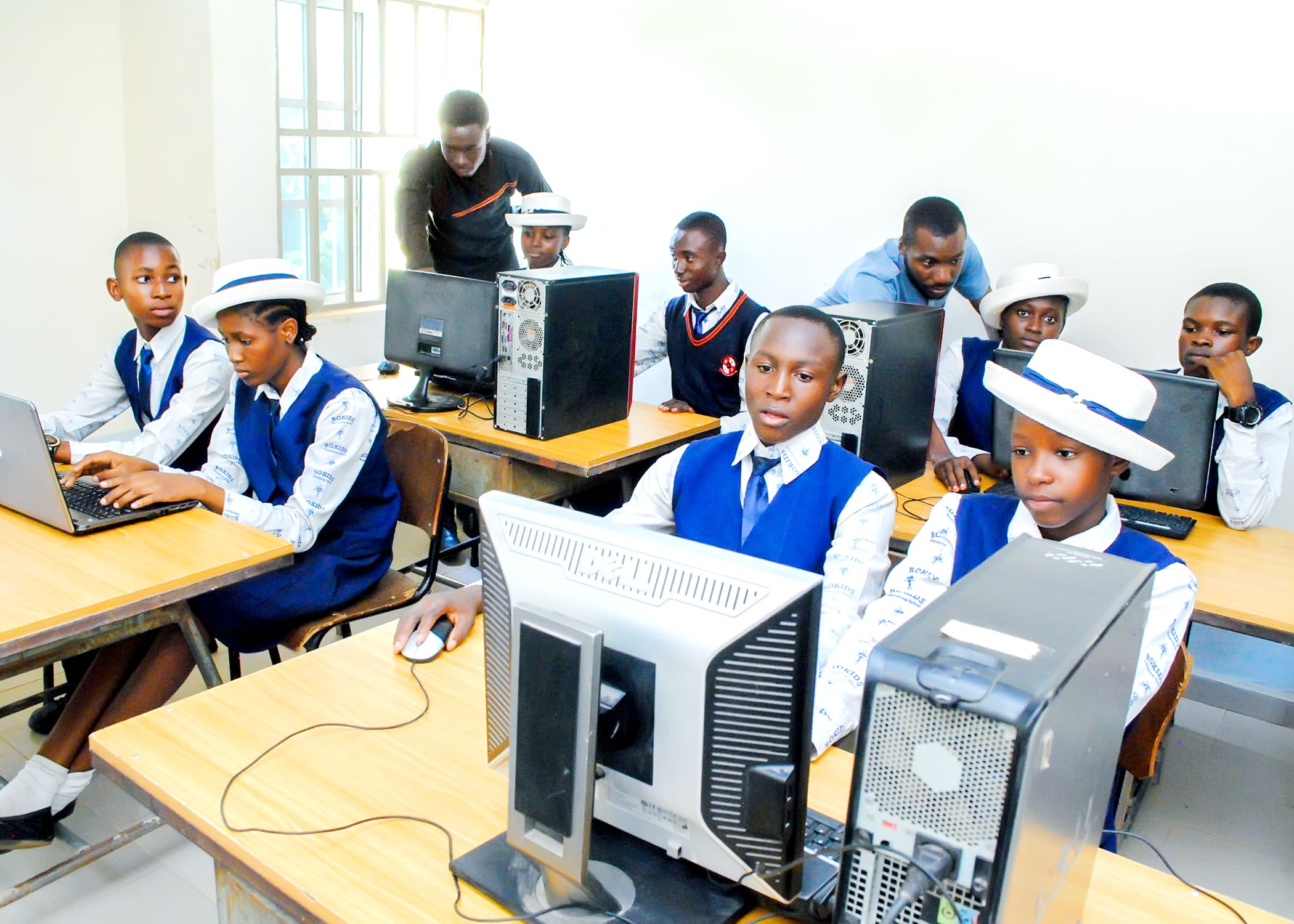 Rokids students learning computer skills in class